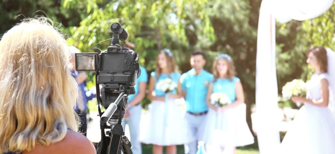 woman-taking-a-video-of-the-bride